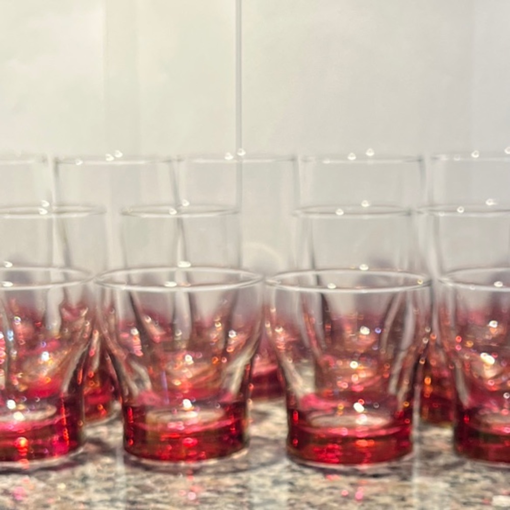 Set of Clear Drinking Glasses with Cranberry Bases